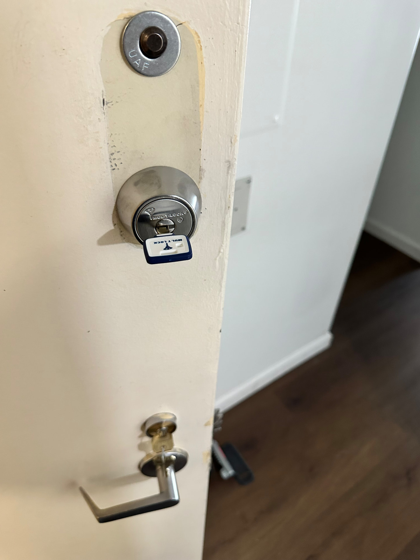 Apartment door with high security deadbolt and Medeco cylinder
