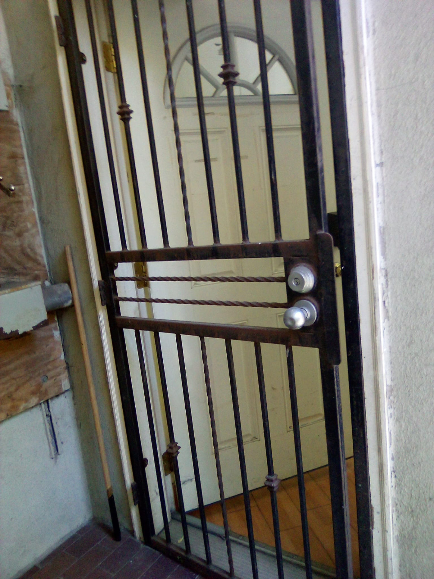 Security gate with multiple locks installed in a Brooklyn home